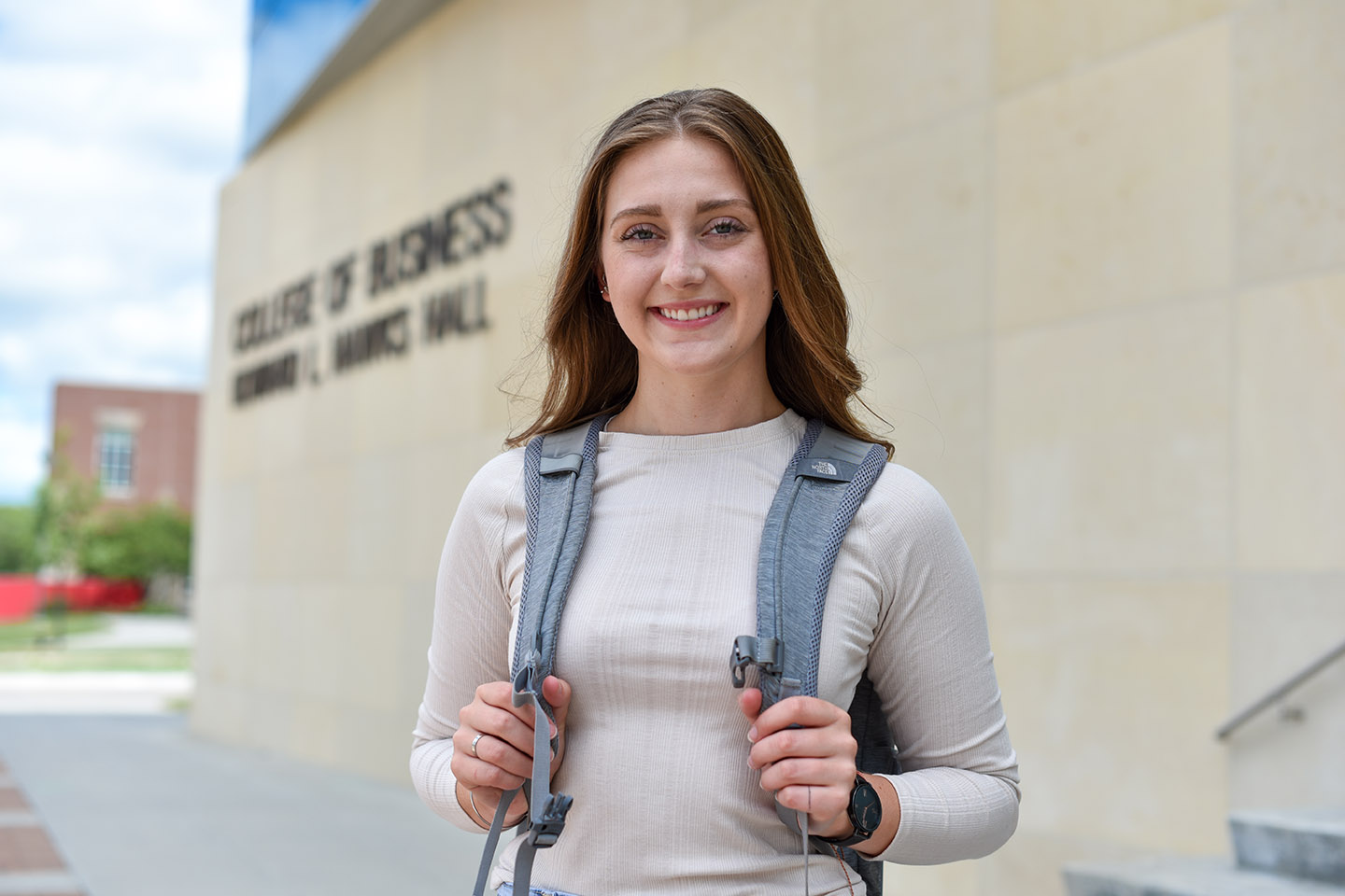 Student sitting on backwards chair